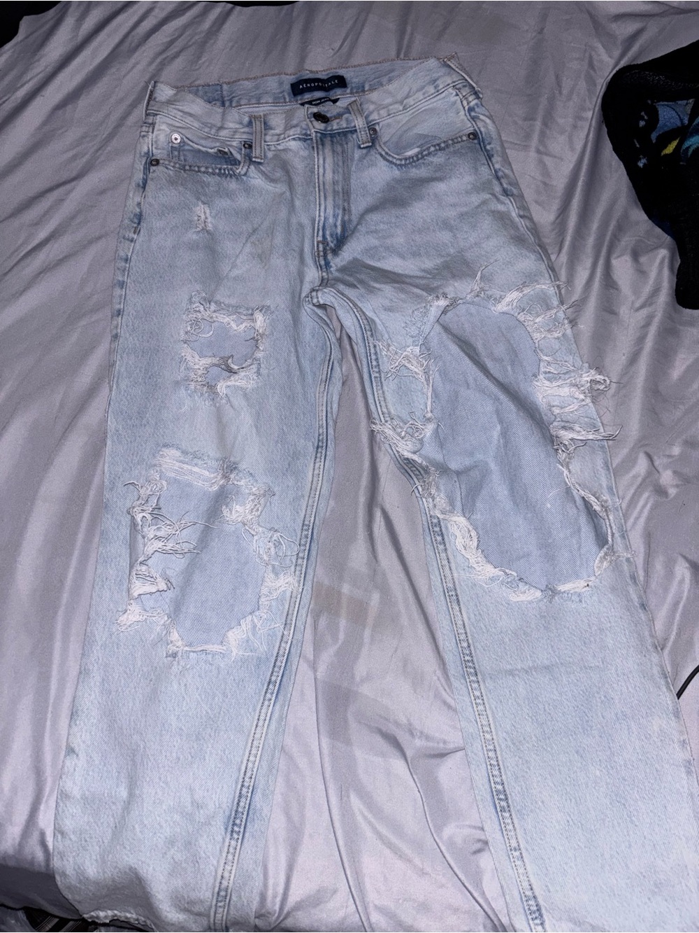 Light Wash Distressed Ripped Jeans